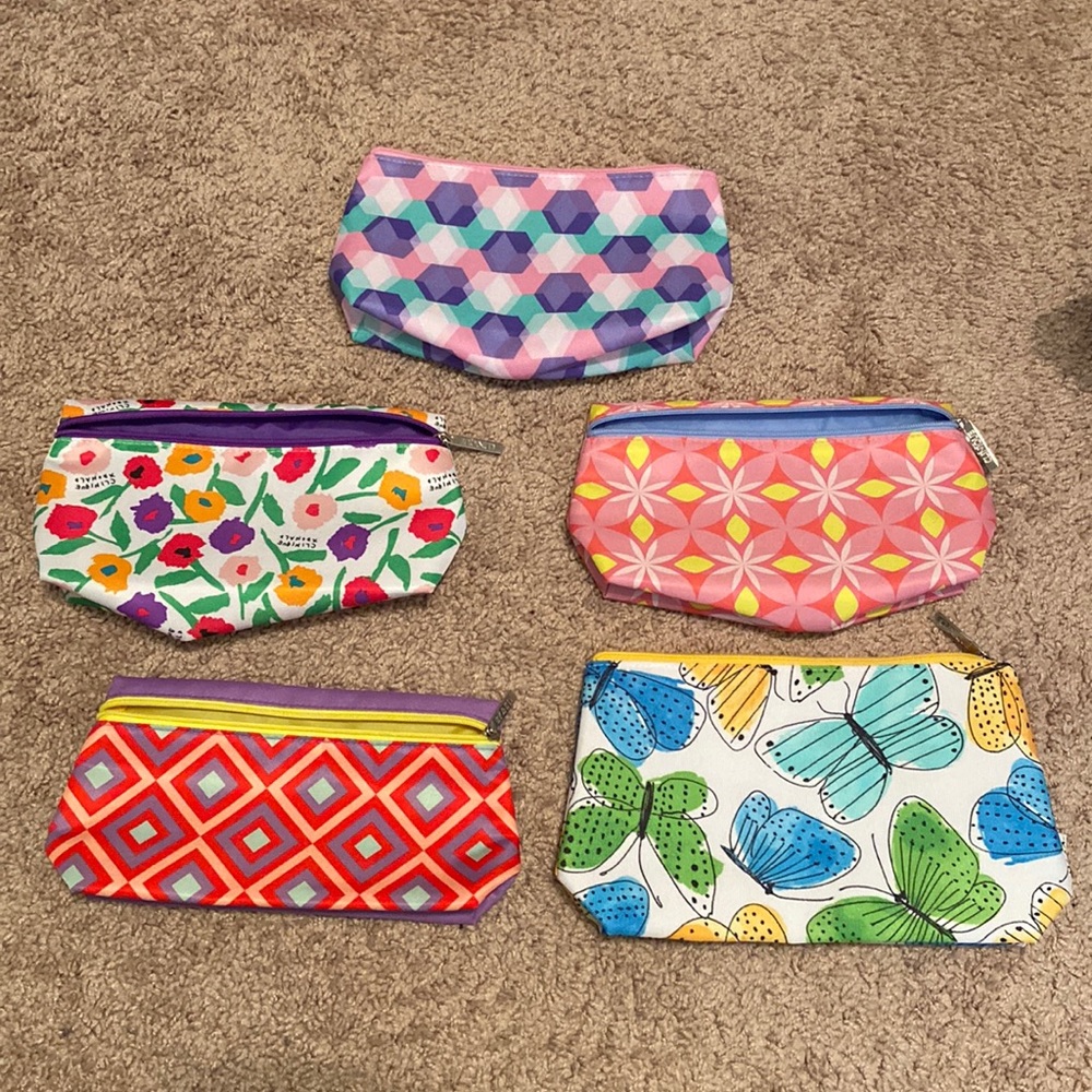New never used Clinique makeup pouches bundle